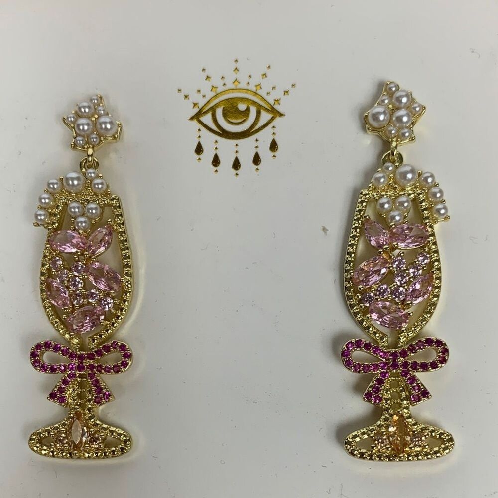 Eye Candy Los Angeles Champagne Earrings Womens OS Gold Pink CZ Bow Flute Dangle